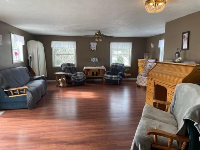1054 Eakin Road Emlenton, PA 16373 - Photo 4 of 15 a living room with furniture window and wooden floor
