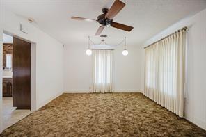 1717 Pipeline Road Cleburne, TX 76033 - Photo 18 of 33 Spare room featuring light carpet and ceiling fan