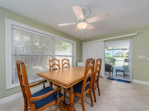 a bathroom with a toilet tub and shower
