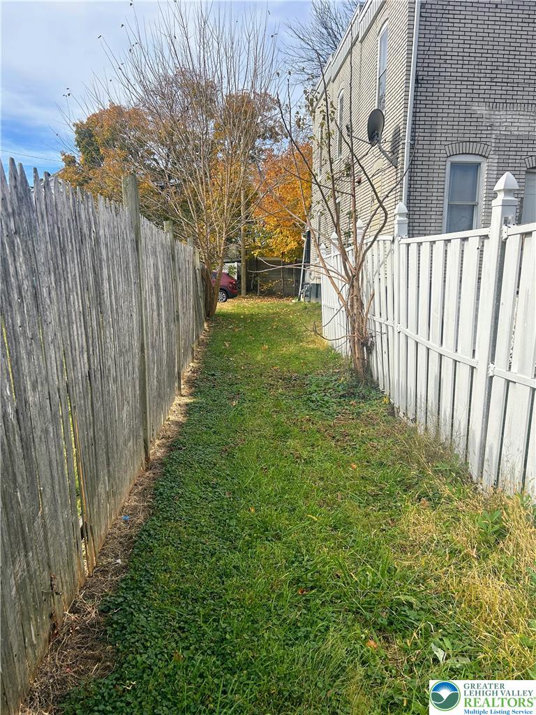 816 North Shell Street Allentown, PA 18109 - Photo 20 of 22 a view of a yard with wooden fence