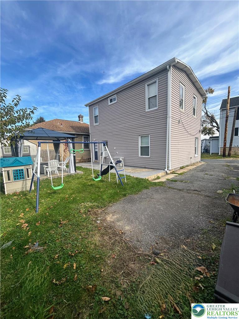 816 North Shell Street Allentown, PA 18109 - Photo 21 of 22 a front view of a house with garden