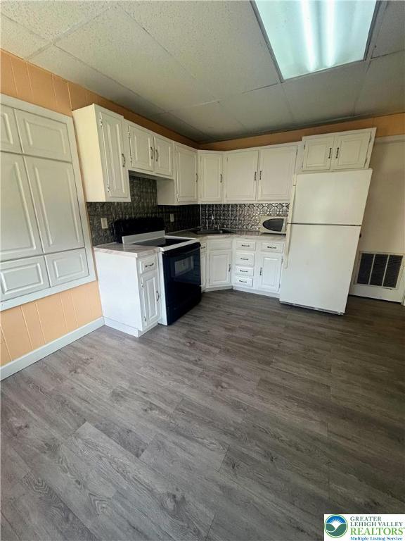 816 North Shell Street Allentown, PA 18109 - Photo 8 of 22 a kitchen with granite countertop a stove a sink and a refrigerator