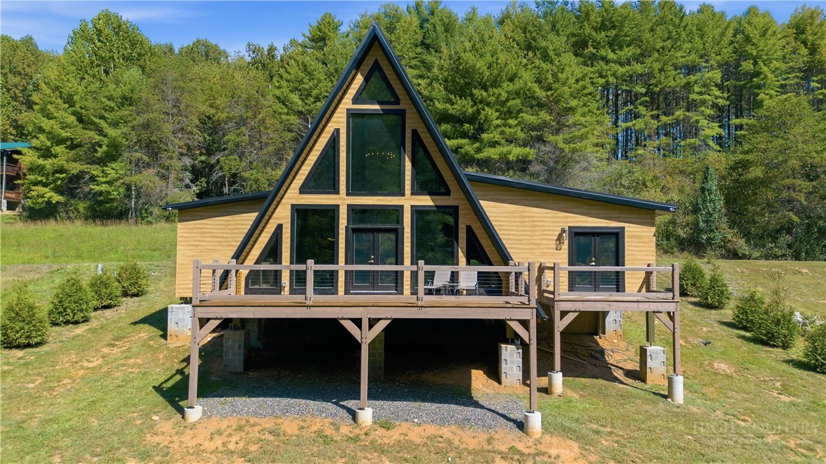 355 South River Hills Road Lansing, NC 28643 - Photo 3 of 45 a view of house with outdoor space