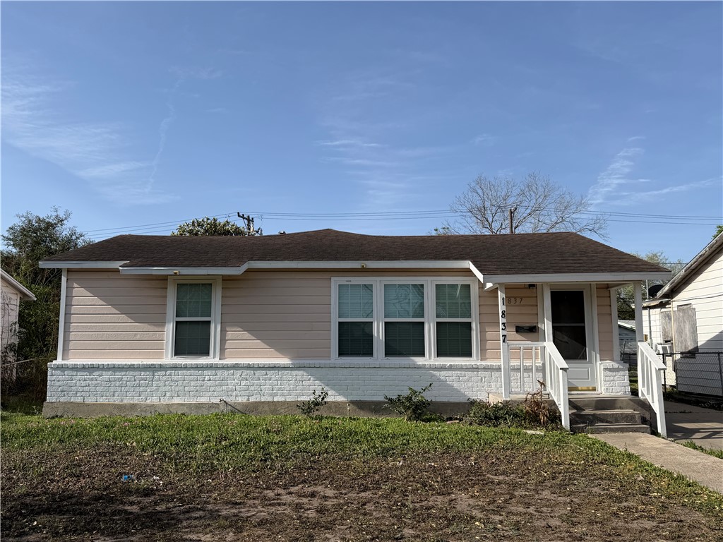 1837 Horne Road Corpus Christi, TX 78416 - Photo 1 of 15 a front view of a house with a yard
