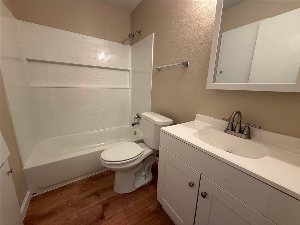 1837 Horne Road Corpus Christi, TX 78416 - Photo 5 of 15 a bathroom with a sink toilet and shower