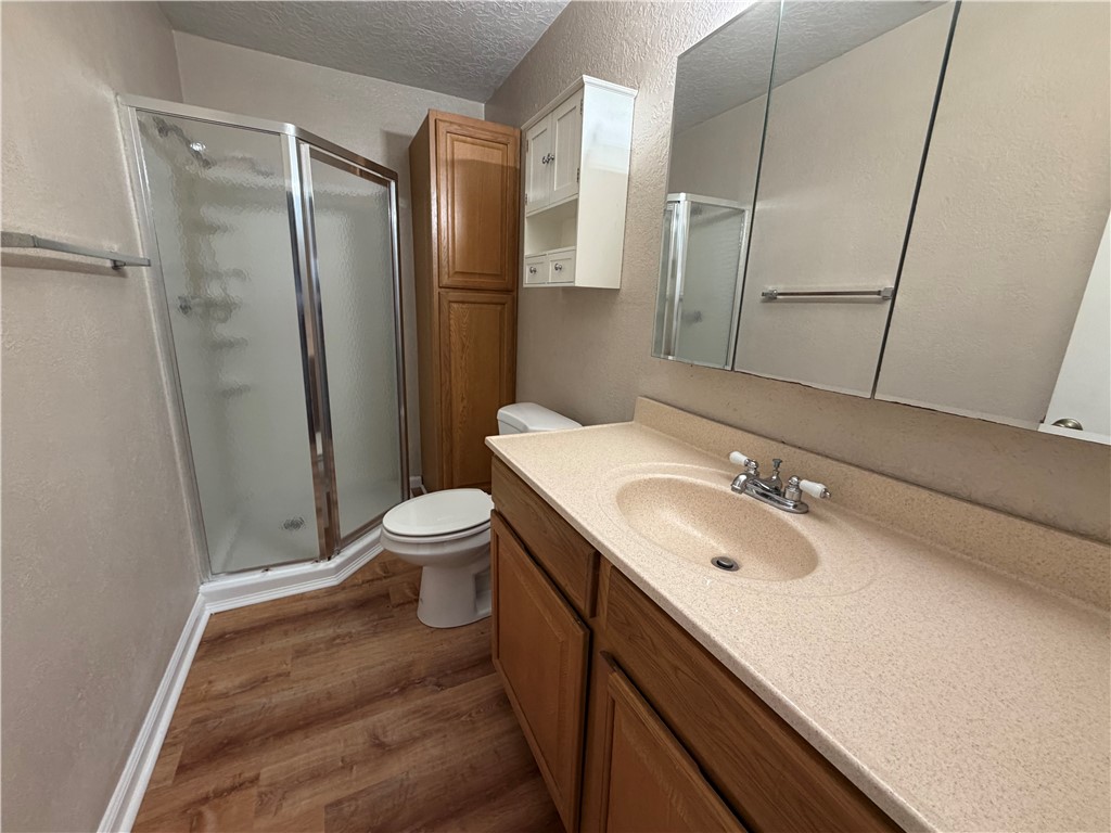 1837 Horne Road Corpus Christi, TX 78416 - Photo 10 of 15 a bathroom with a sink a toilet and shower