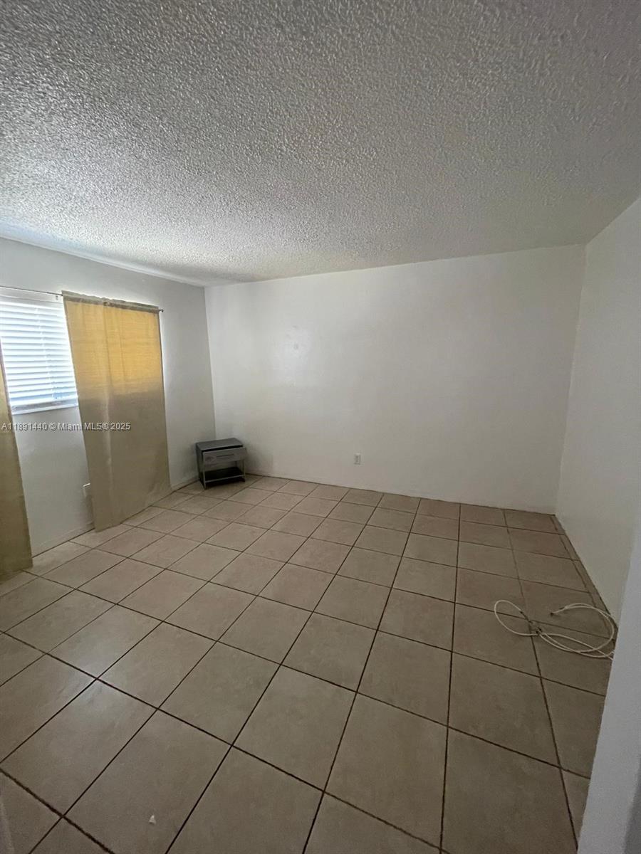 16851 Northeast 18th Avenue, Unit 212 North Miami Beach, FL 33162 - Photo 4 of 8