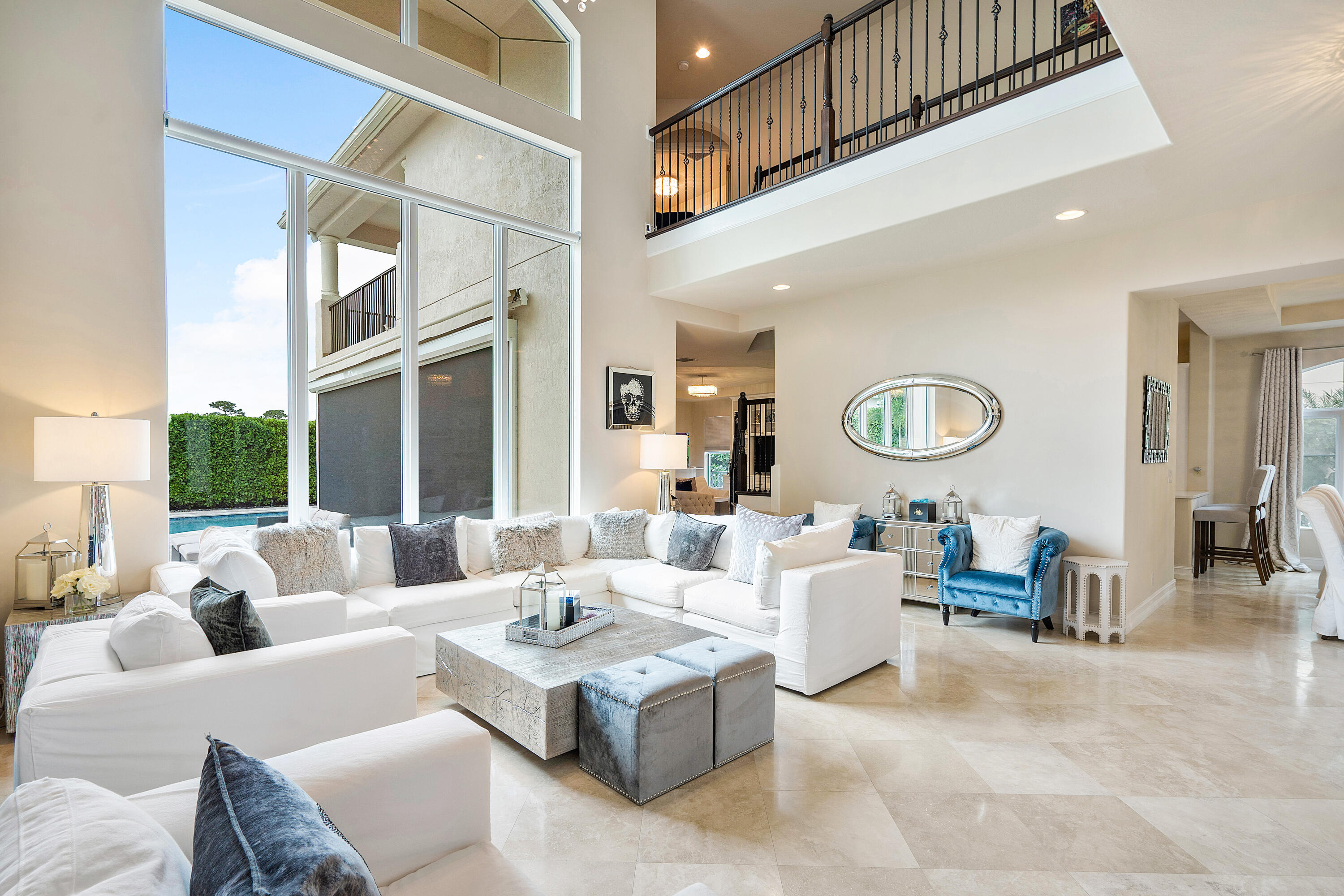 141 Sonata Drive Jupiter, FL 33478 - Photo 2 of 56 Grand 2-Story Windows looking to Pool