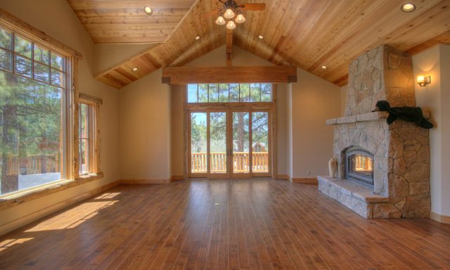 350 Skidder Trail Northstar, CA 96161 - Photo 2 of 9 a view of an empty room with wooden floor and a window