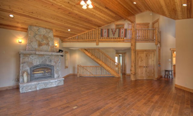 350 Skidder Trail Northstar, CA 96161 - Photo 4 of 9 a view of a livingroom with wooden floor and a fireplace
