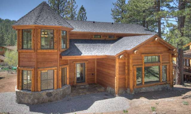 350 Skidder Trail Northstar, CA 96161 - Photo 9 of 9 a view of a brick house with large windows and a small yard