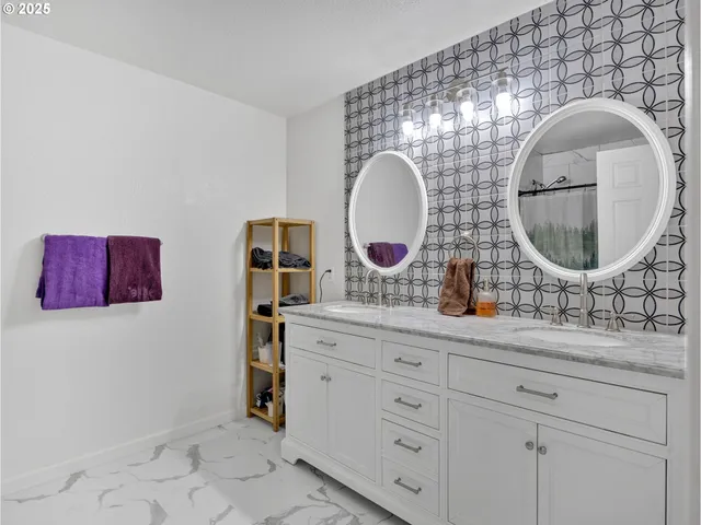 a bathroom with a tub and shower