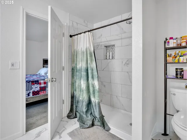 a bedroom with a bed and a closet