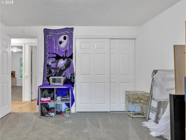 a view of an entryway with front door