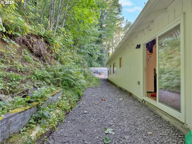 a view of a pathway with a yard