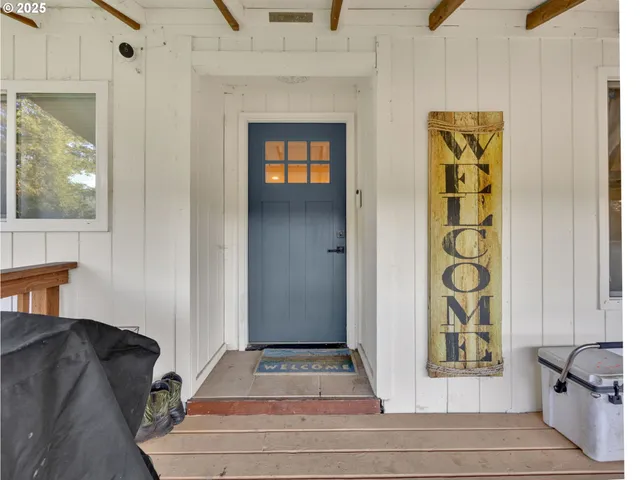 a view of a dinning room with wooden floor