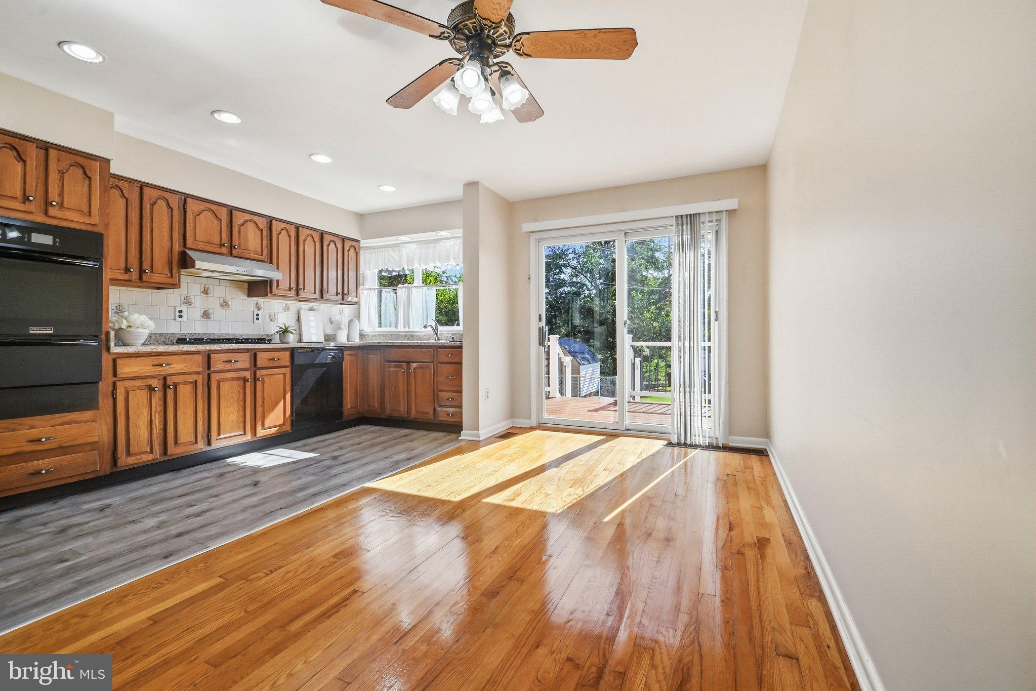 747 Old Riverside Road Baltimore, MD 21225 - Photo 7 of 26 Dining Room with Hardwood Floors