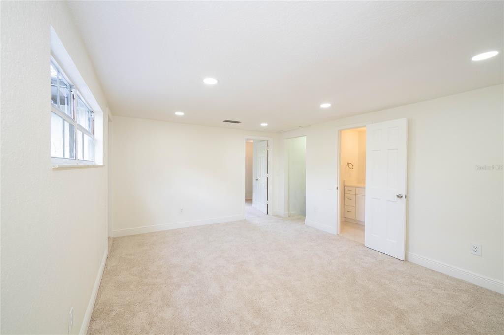 19003 Cedar Lane Lutz, FL 33548 - Photo 27 of 40 a view of an empty room with a window