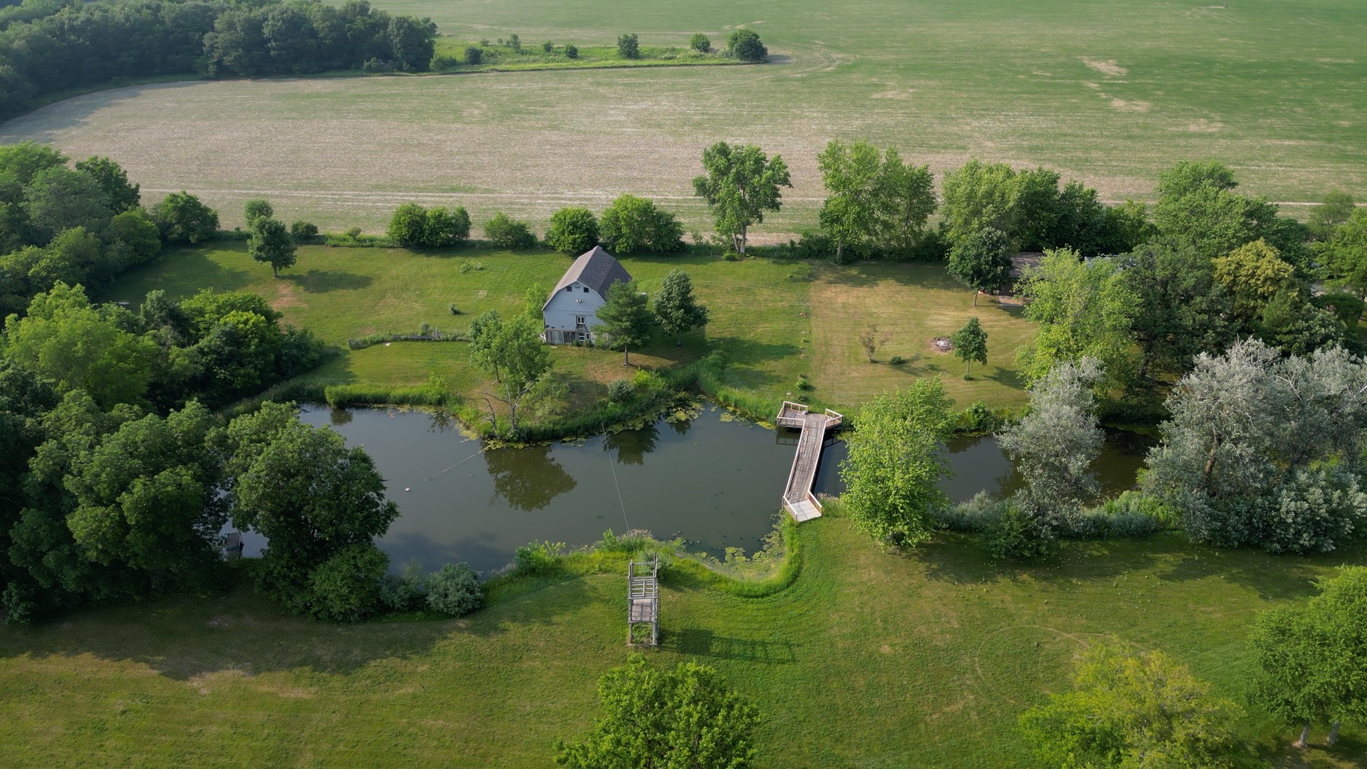 31091 North 700 E Road Cornell, IL 61319 - Photo 54 of 58 a view of a lake with houses in outdoor space