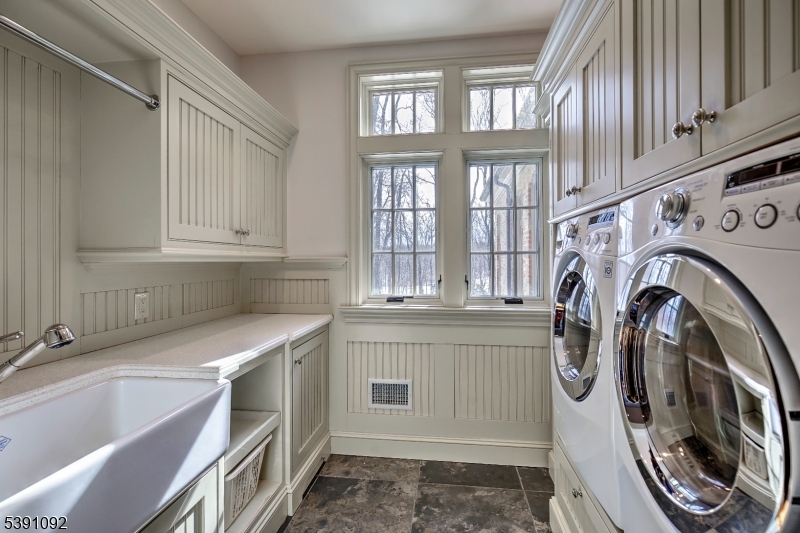 156 Overleigh Road Bernardsville, NJ 07924 - Photo 18 of 39 a view of a kitchen with washer and dryer