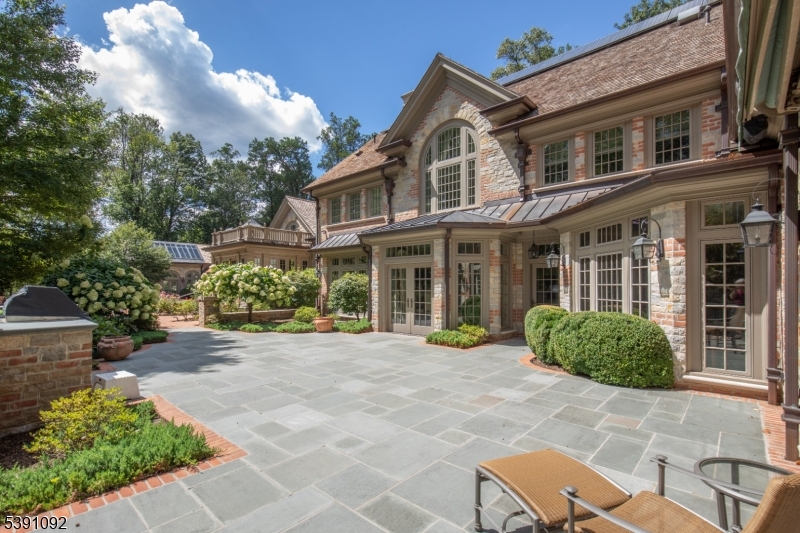 156 Overleigh Road Bernardsville, NJ 07924 - Photo 36 of 39 a front view of a house with a garden