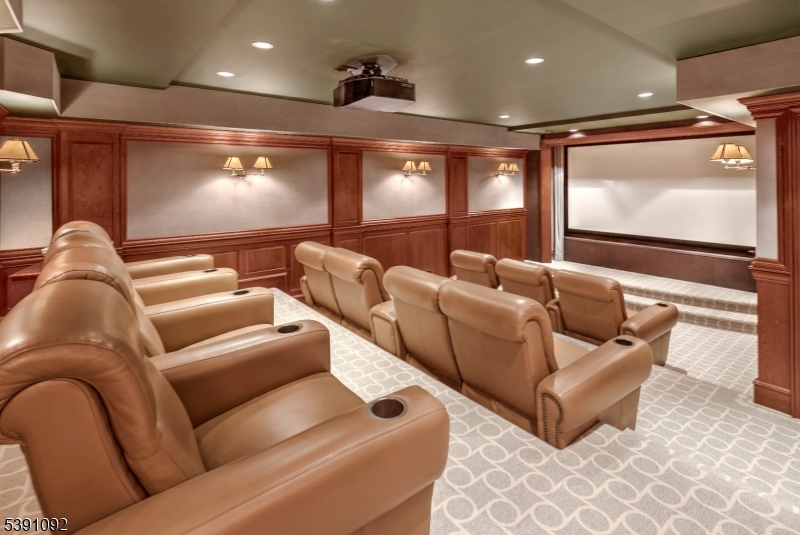 156 Overleigh Road Bernardsville, NJ 07924 - Photo 38 of 48 a media room with furniture a projector and screen