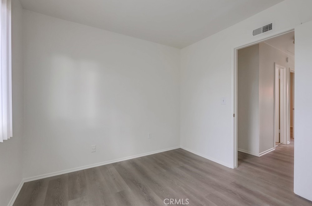 5429 Cajon Avenue Buena Park, CA 90621 - Photo 15 of 22 a view of an empty room with wooden floor and closet