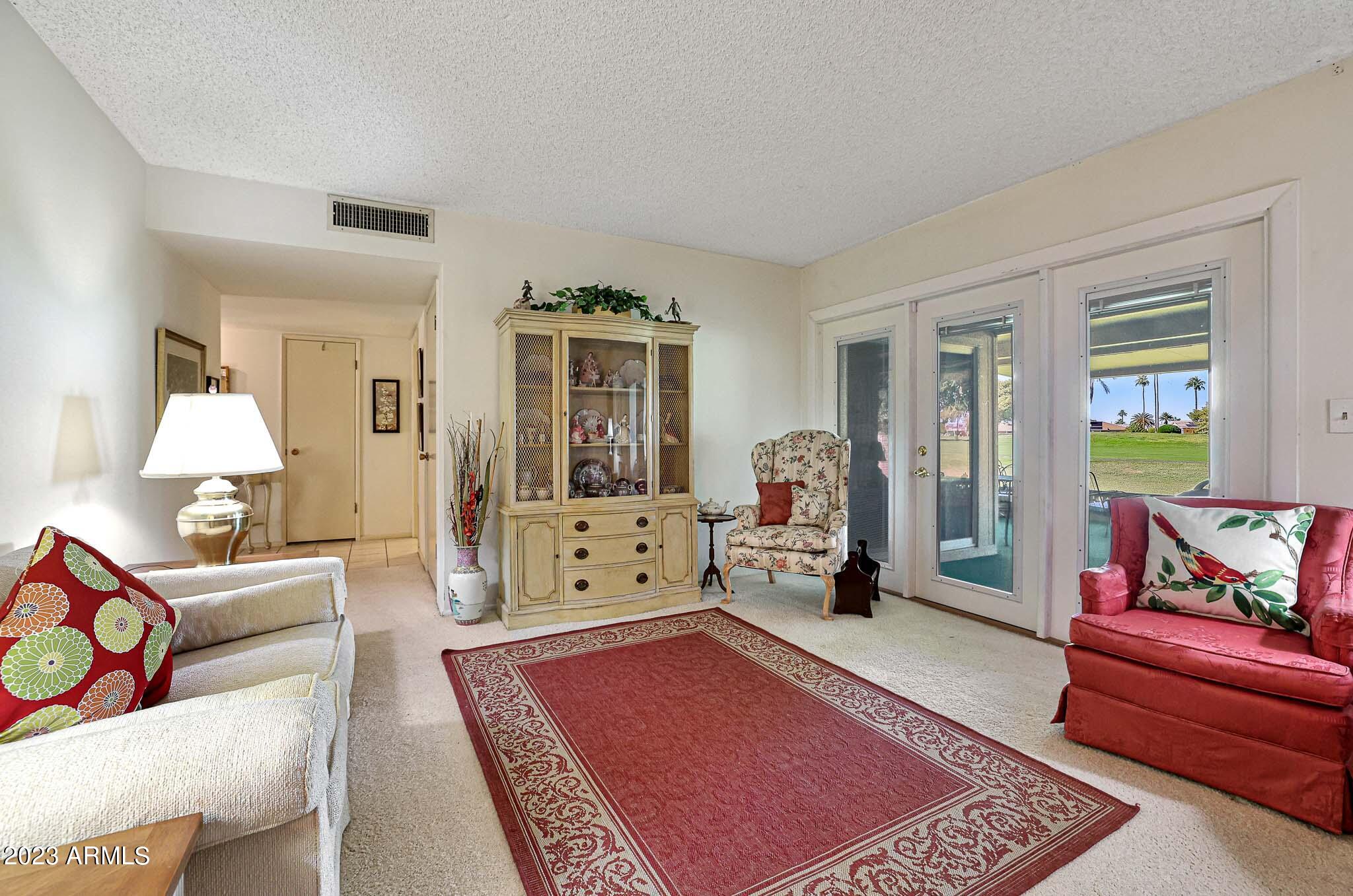 10130 West Mountain View Road Sun City, AZ 85351 - Photo 14 of 47 Living Room