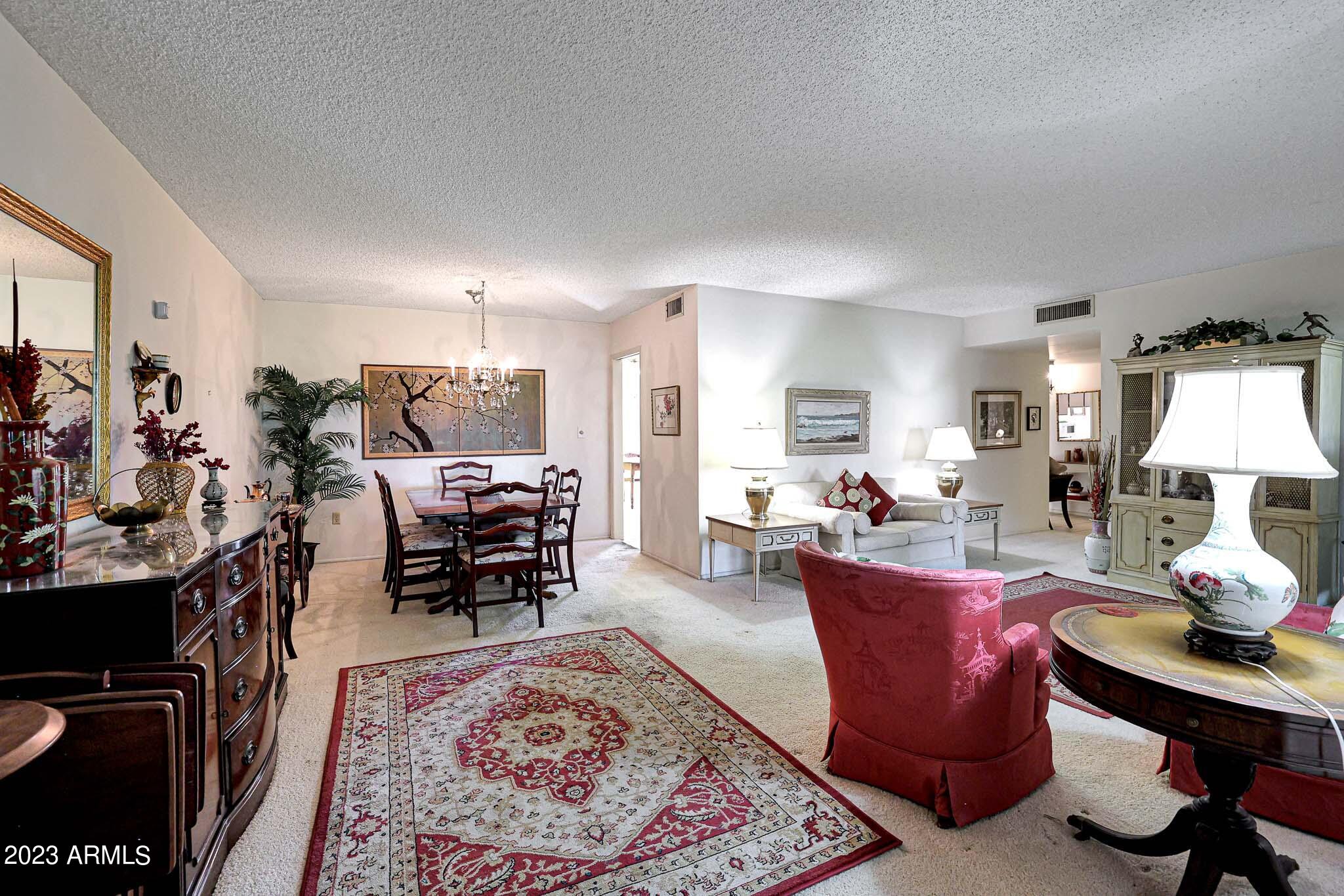 10130 West Mountain View Road Sun City, AZ 85351 - Photo 15 of 47 Living Room