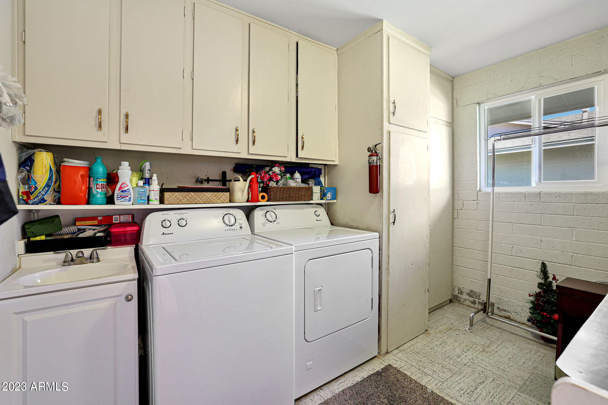 10130 West Mountain View Road Sun City, AZ 85351 - Photo 32 of 47 Laundry