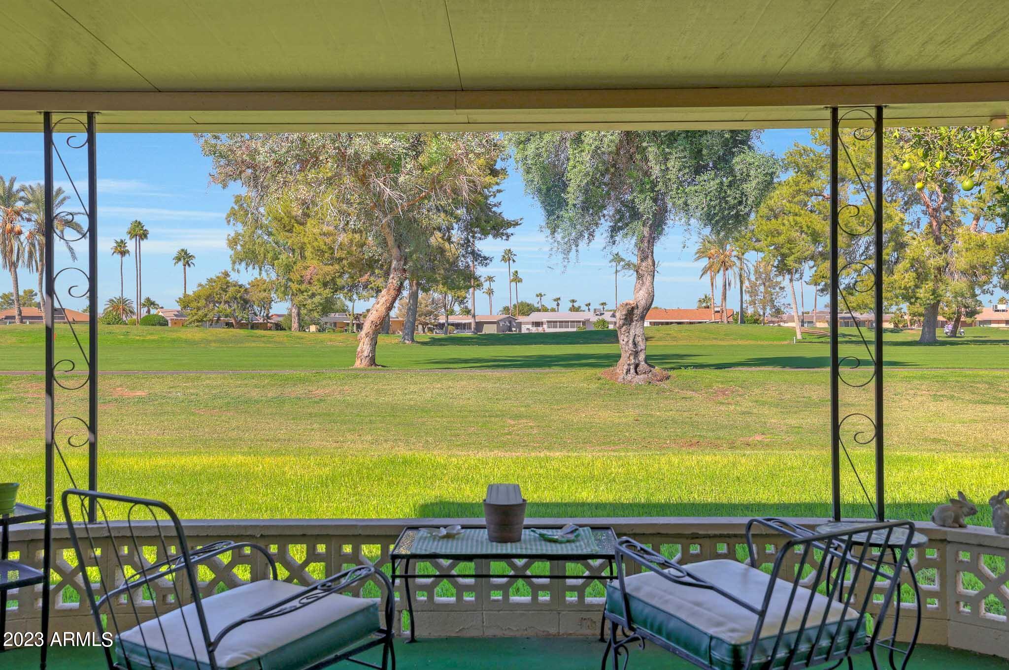 10130 West Mountain View Road Sun City, AZ 85351 - Photo 5 of 47 Back Covered Patio