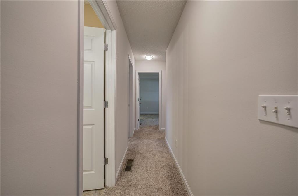 17 West Ridge Drive Southeast Cartersville, GA 30121 - Photo 15 of 37 a view of a hallway with wooden floor