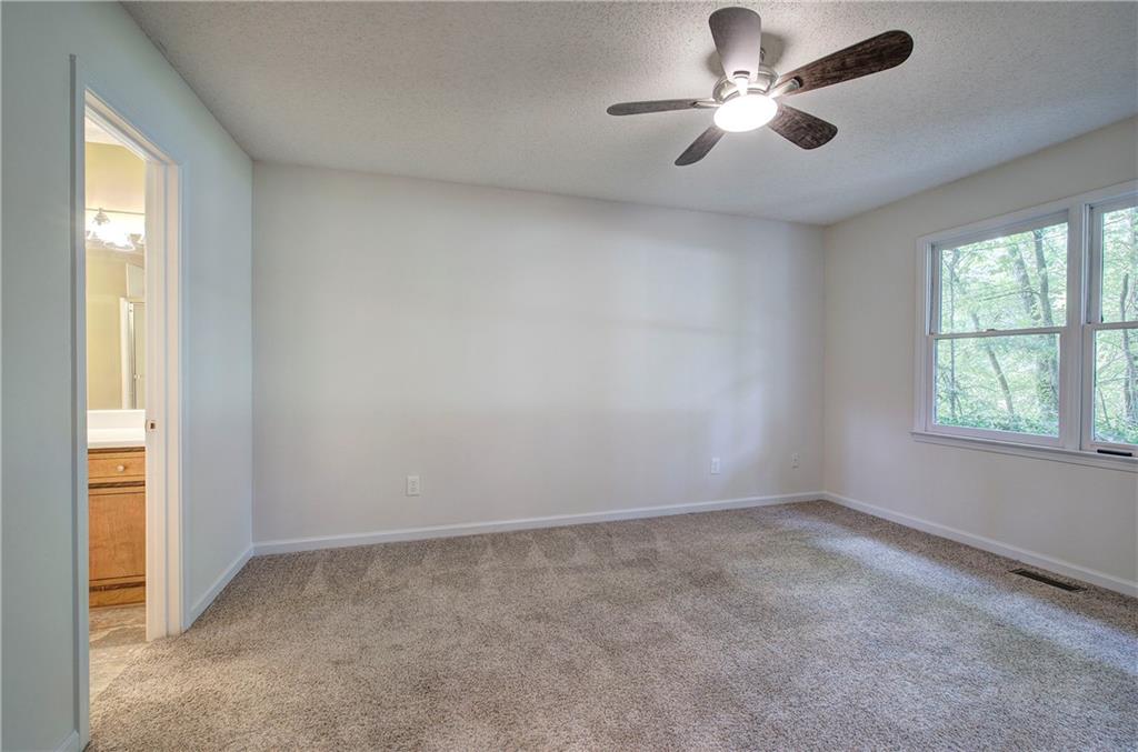 17 West Ridge Drive Southeast Cartersville, GA 30121 - Photo 16 of 37 a view of an empty room with a window