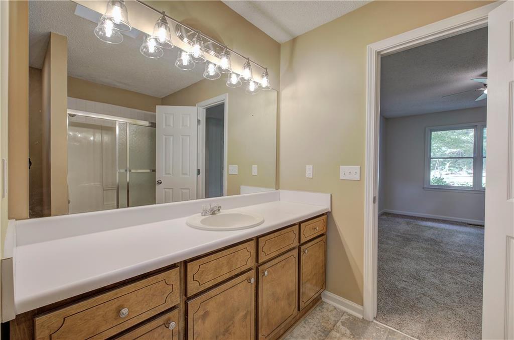 17 West Ridge Drive Southeast Cartersville, GA 30121 - Photo 20 of 37 a bathroom with a sink vanity and a mirror