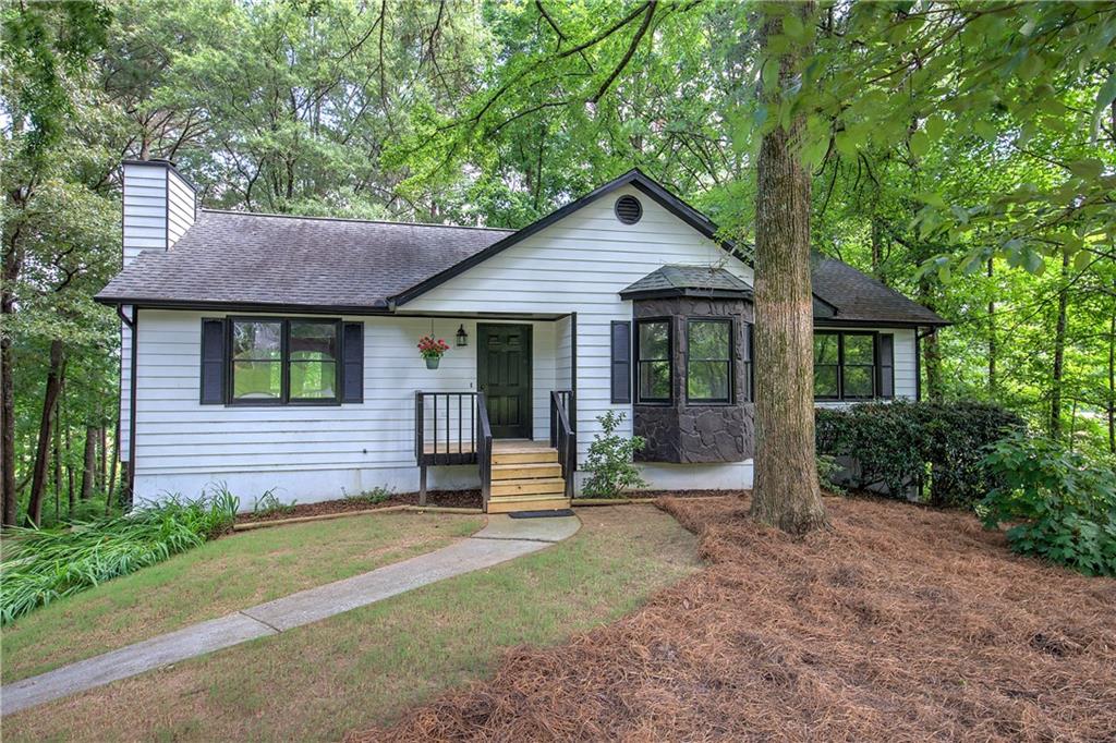 17 West Ridge Drive Southeast Cartersville, GA 30121 - Photo 2 of 37 a front view of a house with garden