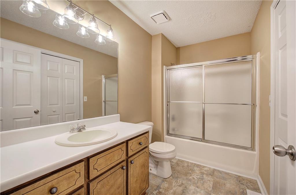 17 West Ridge Drive Southeast Cartersville, GA 30121 - Photo 25 of 37 a bathroom with a sink toilet and shower