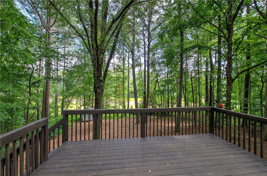 17 West Ridge Drive Southeast Cartersville, GA 30121 - Photo 31 of 37 a view of a wooden deck and a forest