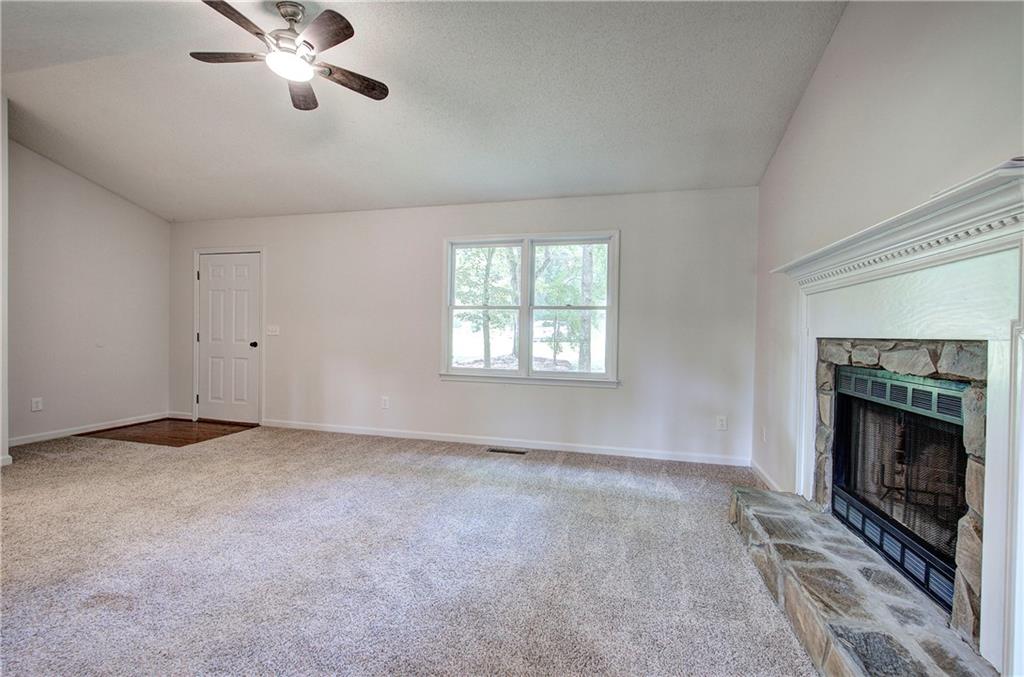 17 West Ridge Drive Southeast Cartersville, GA 30121 - Photo 9 of 37 a view of empty room with a fireplace