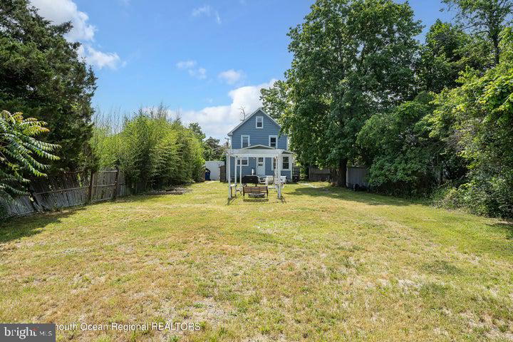 109 South Main Street Toms River, NJ 08757 - Photo 26 of 26 a house with swimming pool in front of it