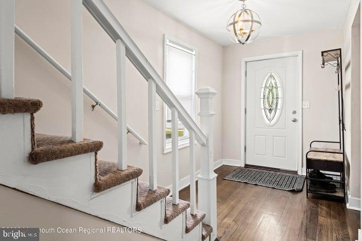 109 South Main Street Toms River, NJ 08757 - Photo 4 of 26 a living room with wooden floor and furniture