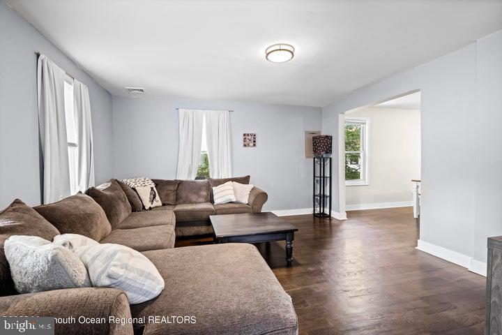109 South Main Street Toms River, NJ 08757 - Photo 5 of 26 a living room with furniture and a window