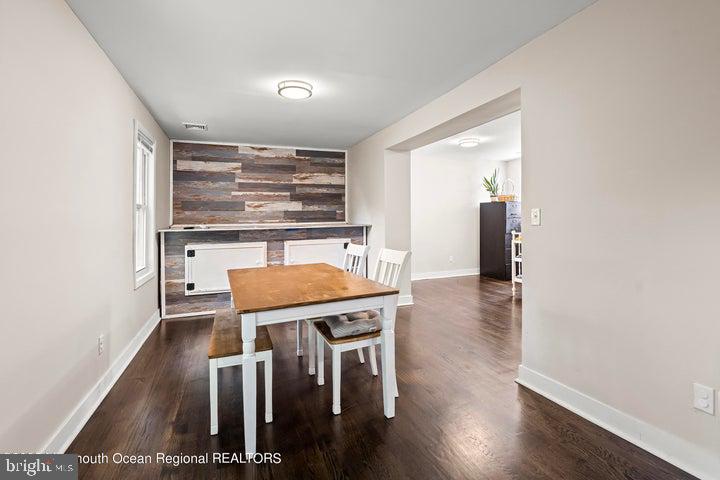 109 South Main Street Toms River, NJ 08757 - Photo 7 of 26 a view of a dining room with furniture and wooden floor