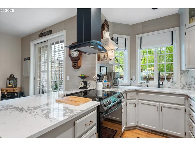 a kitchen with a sink and a window