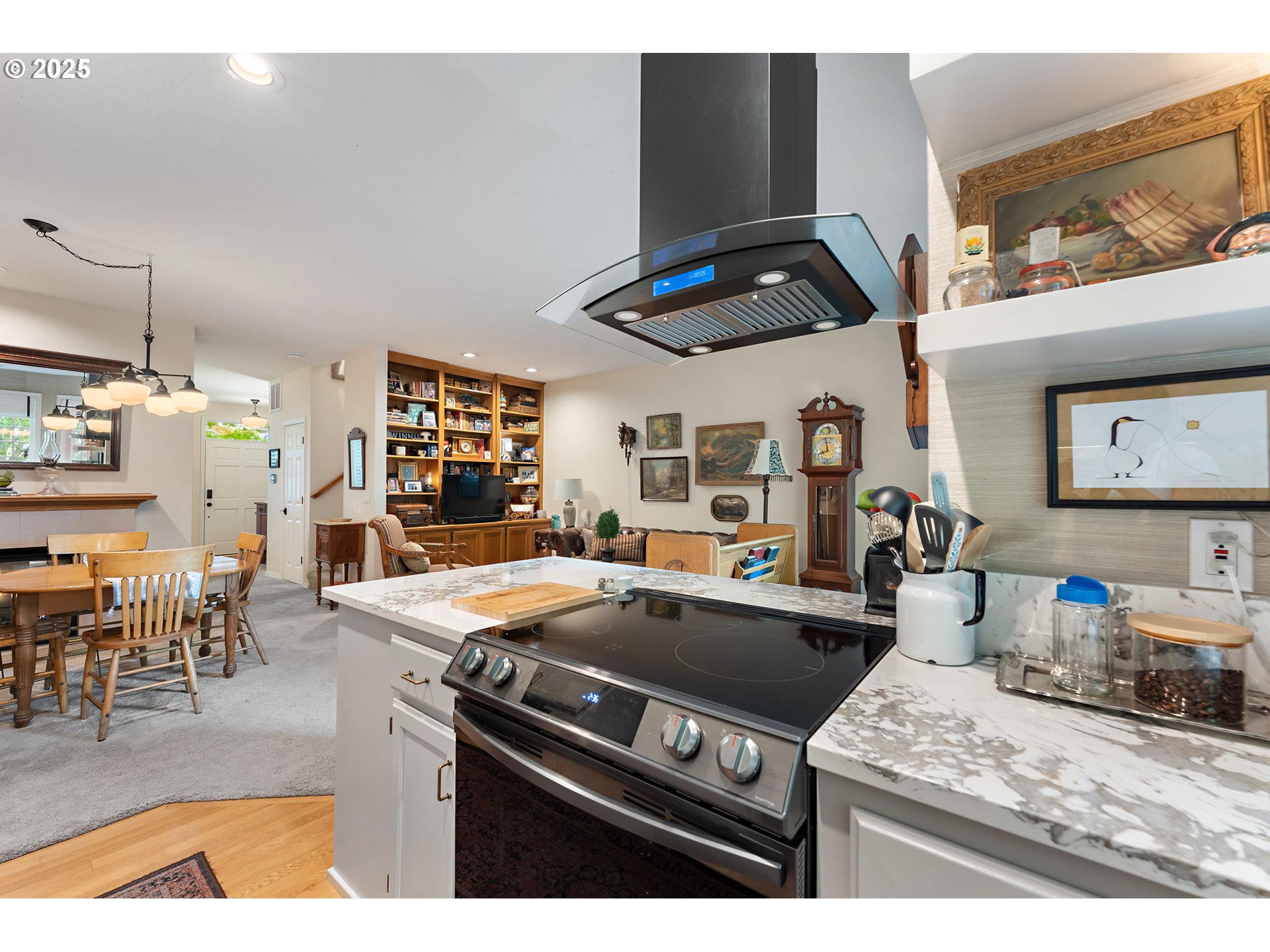 8200 Southwest Maxine Lane, Unit 59 Wilsonville, OR 97070 - Photo 16 of 33 a kitchen with stainless steel appliances granite countertop a sink a stove and a refrigerator