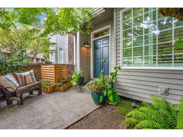 a view of a wooden bench sitting in back yard