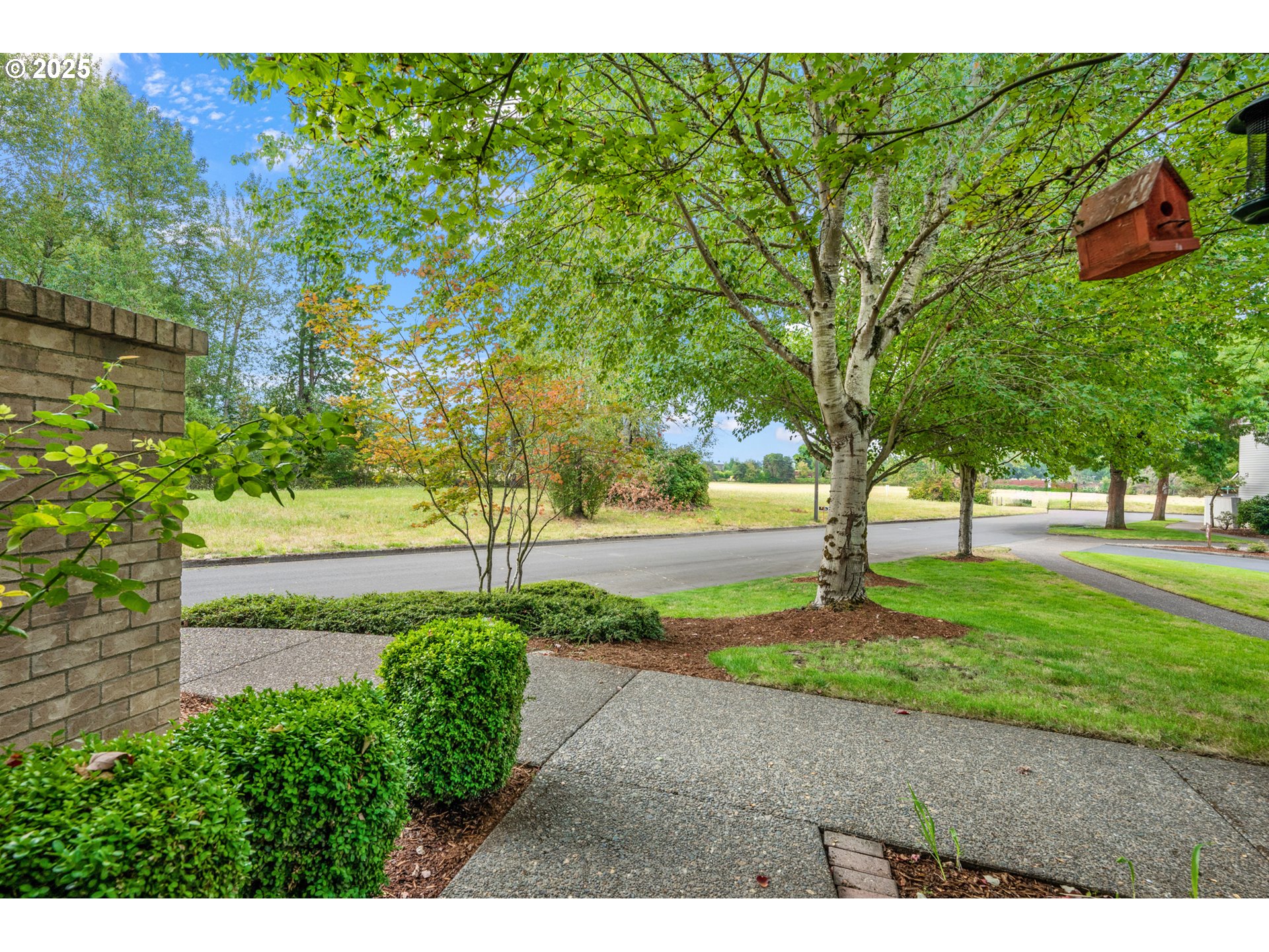 8200 Southwest Maxine Lane, Unit 59 Wilsonville, OR 97070 - Photo 30 of 33 a view of a garden with trees