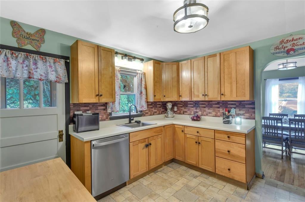 634 Rose Street Apollo, PA 15613 - Photo 12 of 29 a kitchen with a sink stove and cabinets
