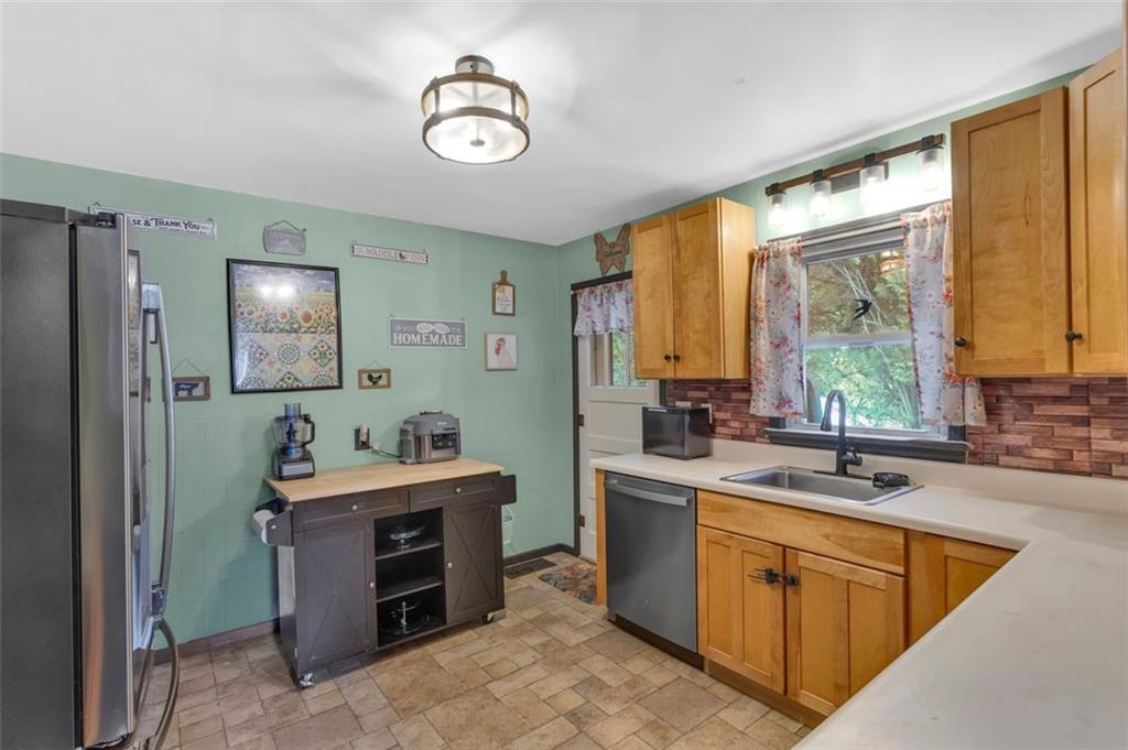 634 Rose Street Apollo, PA 15613 - Photo 14 of 29 a kitchen with a sink cabinets and window