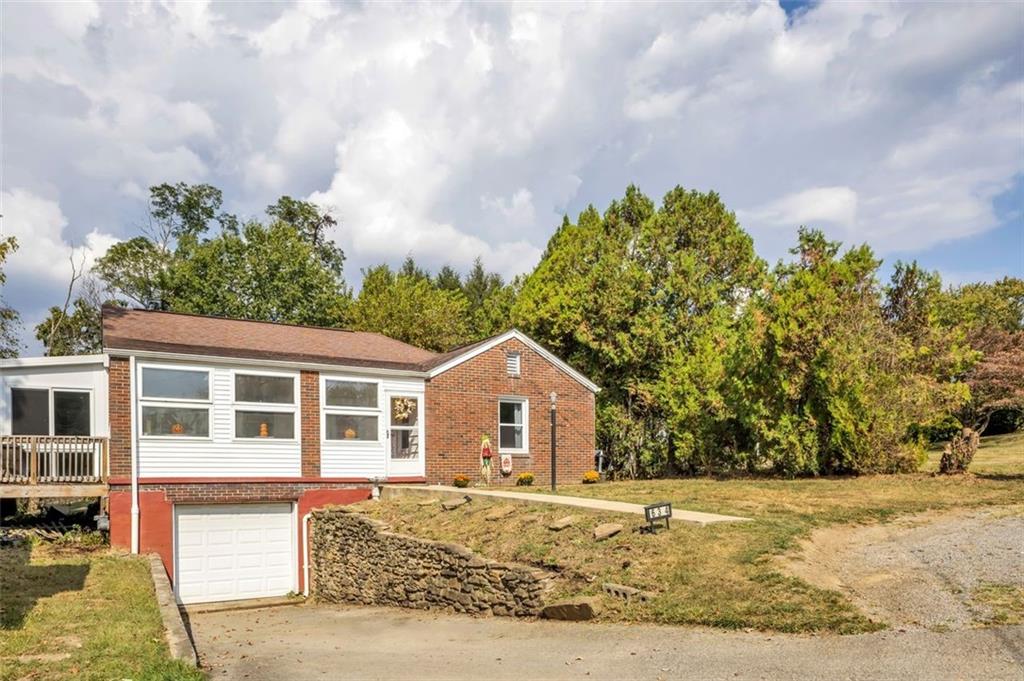 634 Rose Street Apollo, PA 15613 - Photo 24 of 29 a front view of a house with a garden