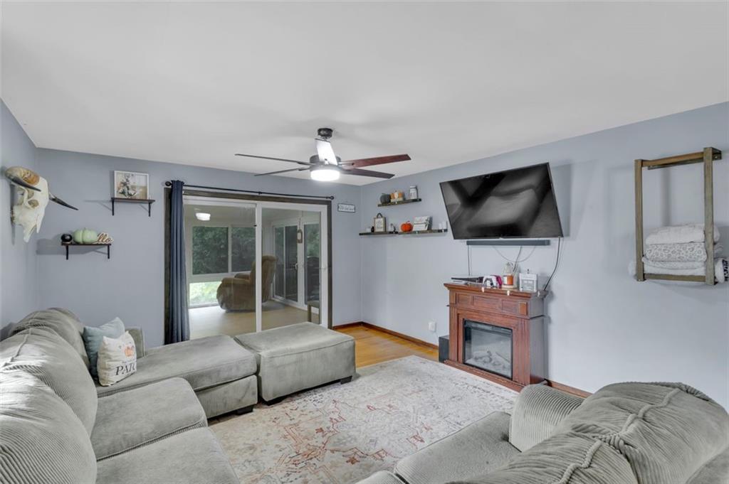 634 Rose Street Apollo, PA 15613 - Photo 5 of 29 a living room with furniture and a flat screen tv